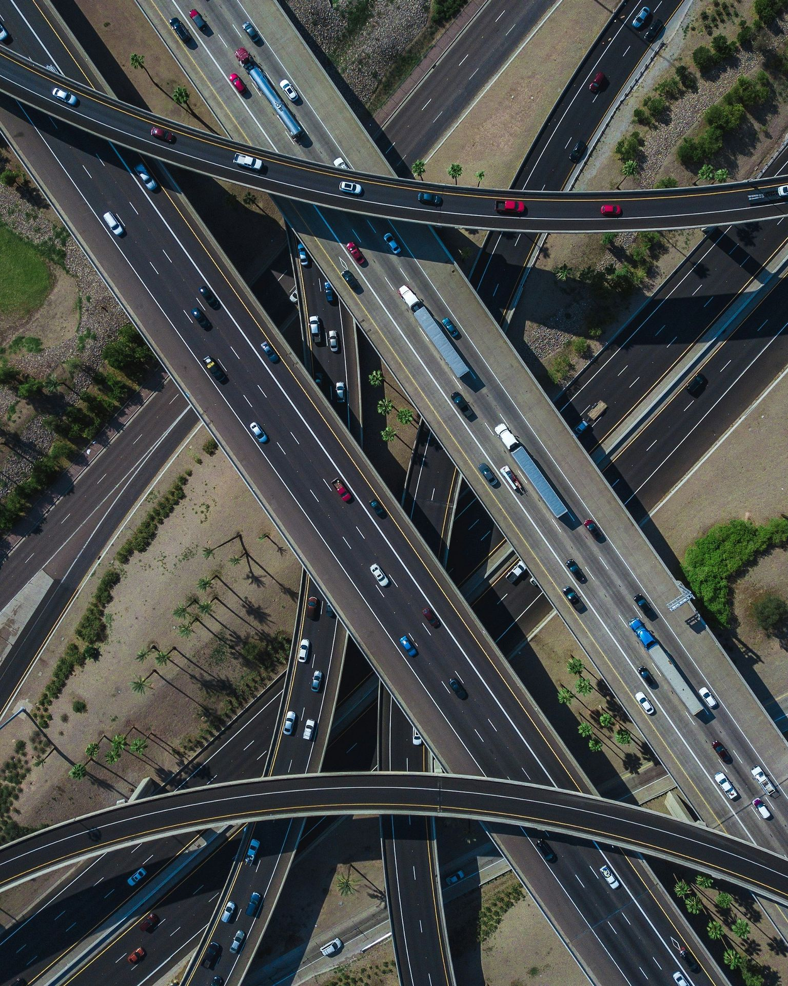 high-angle photo of road with vehicles high-angle photo of road with vehicles
