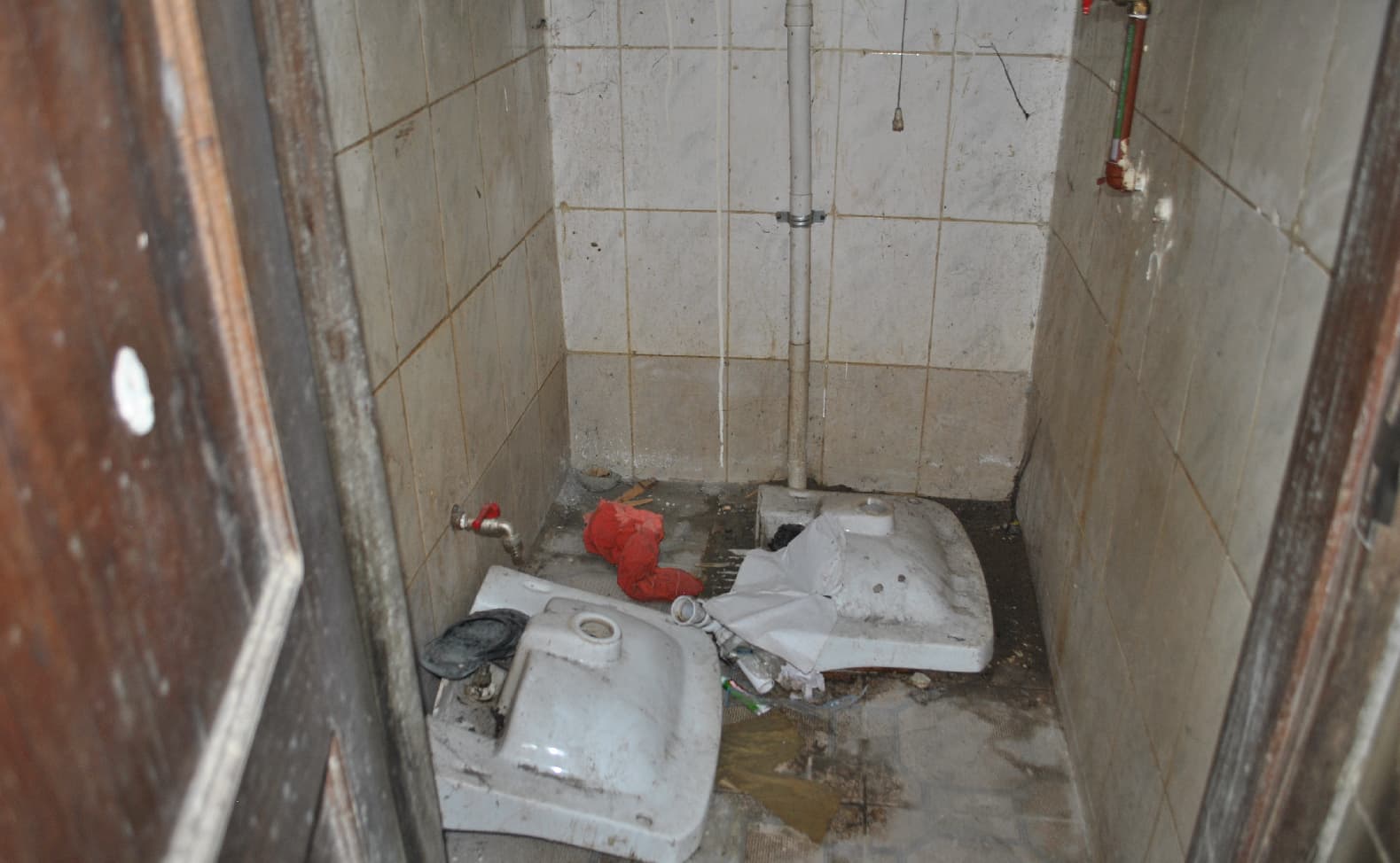 orphanage toilet before